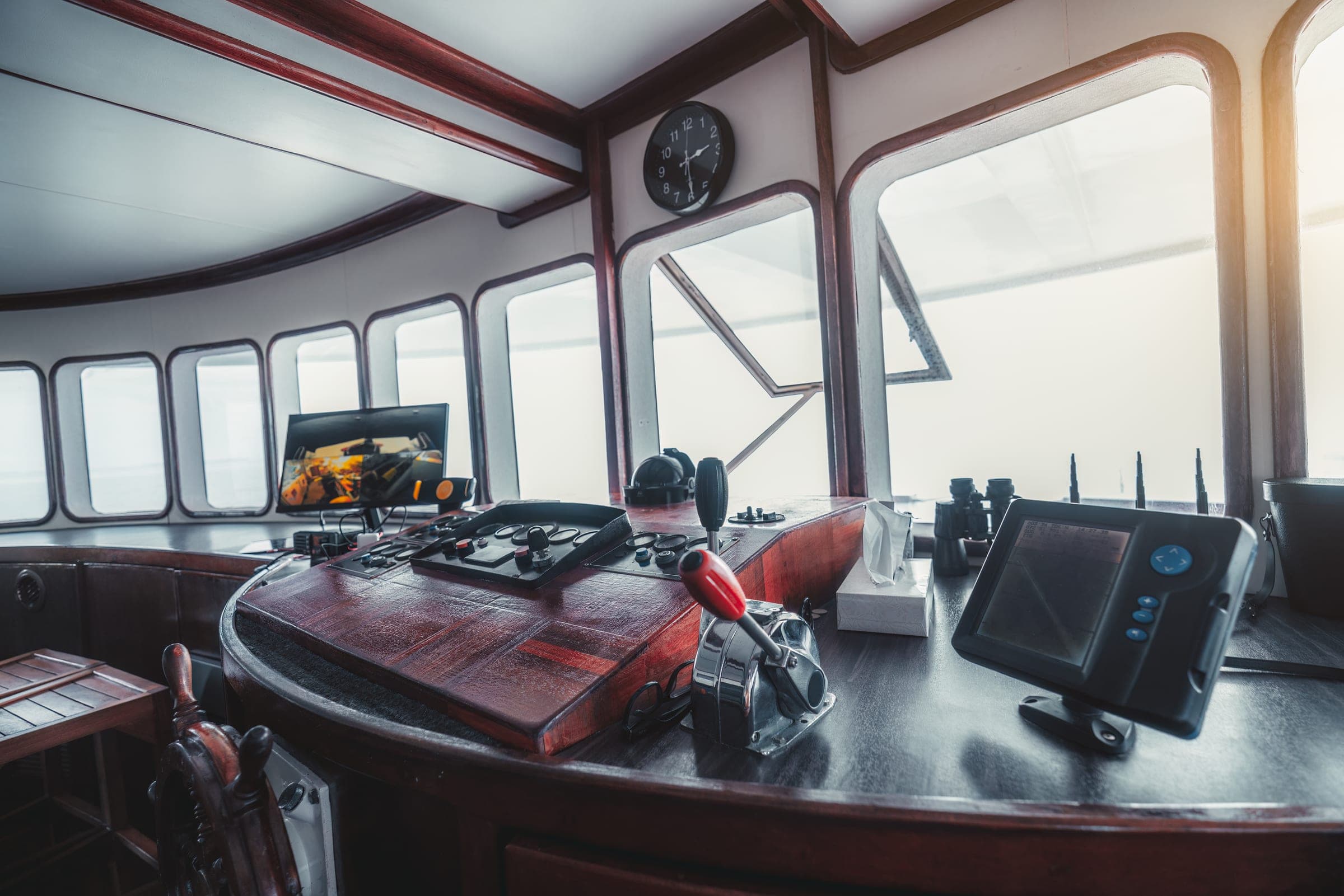 Wheelhouse of a working vessel with navigation instruments
